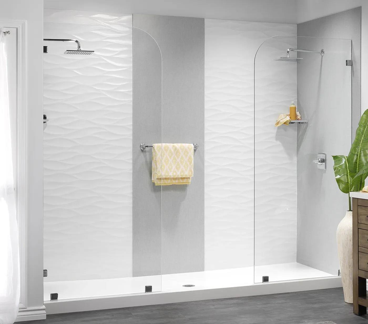 A detailed walk-in shower with curved glass and two shower areas in Fort Smith, AR.